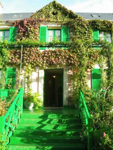 We enter Monet's house on this colorful porch.