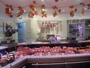 This is a typical meat market in Berncastle, complete with wurst and hanging sausages.
