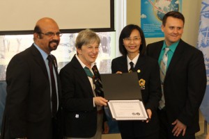 Judith Harris, president of the Southern California Division of the United Nations Association (second from left), Ike Khamisani, president of the Inland Empire Chapter of the Southern California Division of the United Nations Association (first from left), and Brandon Fryman, representative of Amnesty International (first from right), present a certificate of recognition to the representative of Tai Ji Men Qigong Academy (third from left) in recognition of its contributions to the promotion and protection of human rights.