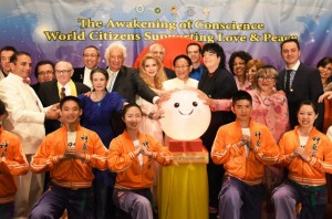 Dr. Hong, president of FOWPAL, and honored guests take a group photo with the Smiley Earth.