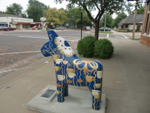 Different designs decorate the Dala horses on most corners.